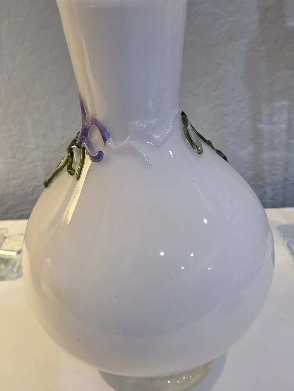White Glass Vase With Raised Delicate Purple Flowers And Green Vines